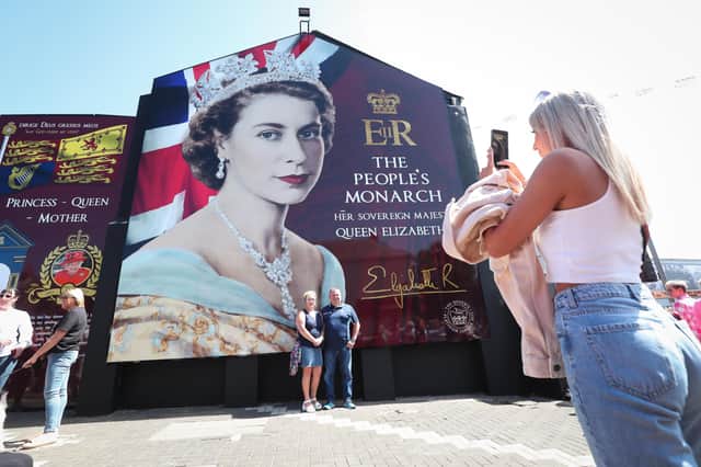Mural of Queen on Shankill Road. The sun is going down on her reign, and it will rise again on a very different world