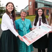 Dame Jocelyn Bell Burnell paid a surprise visit to Strathearn School where she met year 13 pupils (L-R) Jess Ryan, Rosie Hardy and Rebekah Devlin. During the visit, Dame Jocelyn showcased the new Ulster Bank £50 note which features her iconic pulsar discovery and women working in NI's burgeoning life sciences industry.
