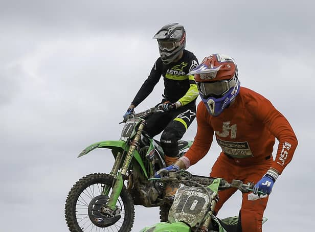 Loughbrickland brothers Jason (10) and John Meara (60) in action at round four of the Irish motocross championship at Gormanstown. Jason went on to claim the overall while John finished runner up.
