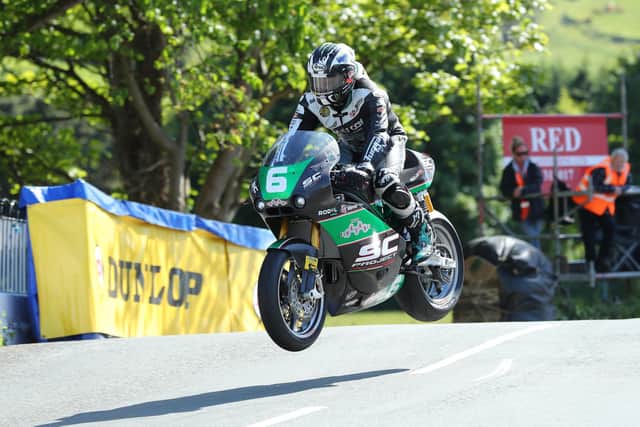 Michael Dunlop was forced out on the final lap of the Supertwin TT on his Paton as he battled with Peter Hickman for the win.