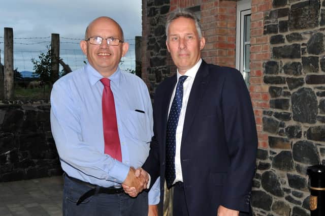 Councillor John Finlay has stood by Ian Paisley Jr MP “through thick and thin”, says the latter. Mr Finlay is seen above in 2018 supporting Mr Paisley at a meeting of the local DUP