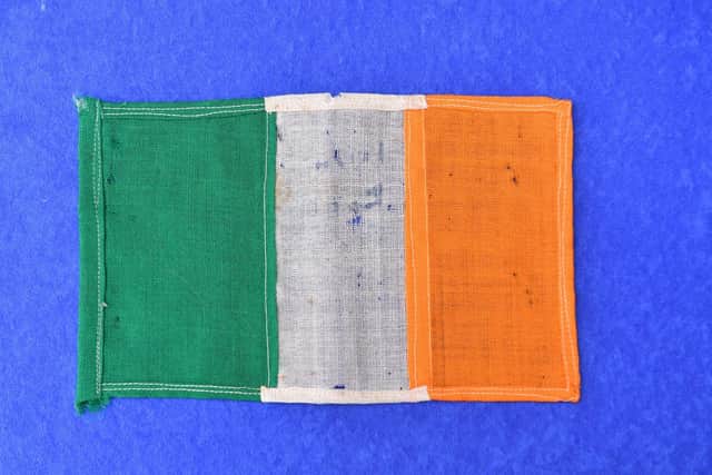 A flag used on Michael Collins' state car which is going under the hammer next week