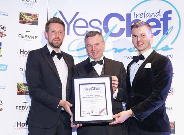 l-r) David Long, General Manager and John McGhee, Assistant Manager, Castello Italia receiving their award from Jim Mulcahy from Bunzl.