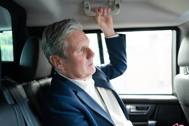 Labour leader Sir Keir Starmer is driven between engagements in Belfast during the final day of his three day visit to Dublin and Belfast