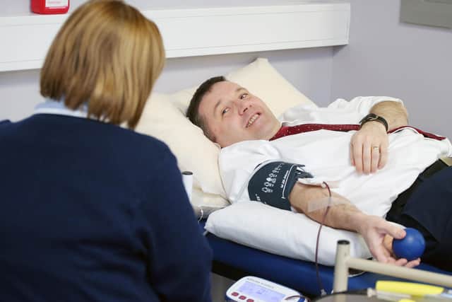Robin Swann, himself a blood donor, said giving blood 'really does save lives'