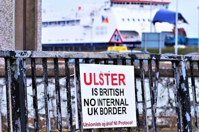 An anti-protocol poster pictured at the Port of Larne earlier this year. Unionists are vociferously opposed to the Protocol, claiming it has undermined the Province's place within the UK