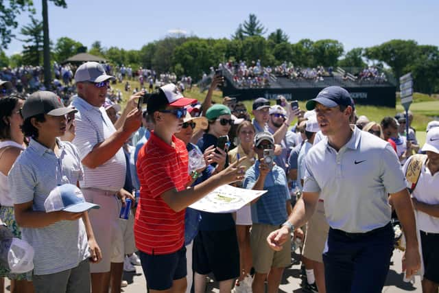 Northern Ireland's Rory McIlroy attracts a crowd as he walks number 13 tee at The Country Club, Tuesday, June 14, 2022, in Brookline, during a practice round ahead of the US Open. Pic by PA.