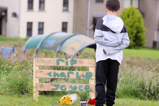 Press Eye - Belfast - Northern Ireland - 17th June 2022

A child looks on at a makeshift memorial for Charlie Joyce.

Picture by Jonathan Porter/PressEye