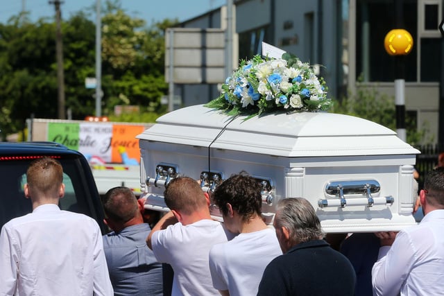 Carrying the coffin of tragic youngster Charlie Joyce