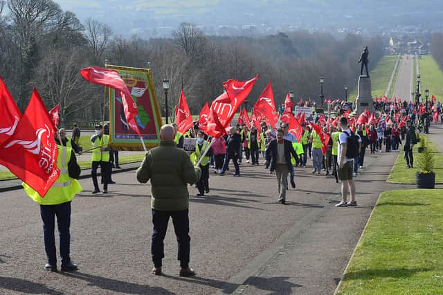 Members of the trade union Unite at a protest at Stormont in March during public sector industrial action