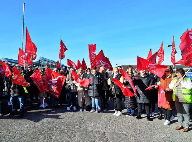 Members of the Unite trade union on a picket line in April outside a school in Belfast during strike action.Picture By: Arthur Allison/Pacemaker Press.