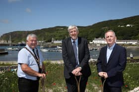 Cllr Ivor Wallace, Mayor of Causeway Coast & Glens Council, John O'Dowd, Minister for Infrastructure and Stephen Fisher, chief executive, Rural Housing Association