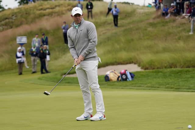 Rory McIlroy reacts after missing a putt on the third hole during the final round of the US Open on Sunday. Pic by PA.