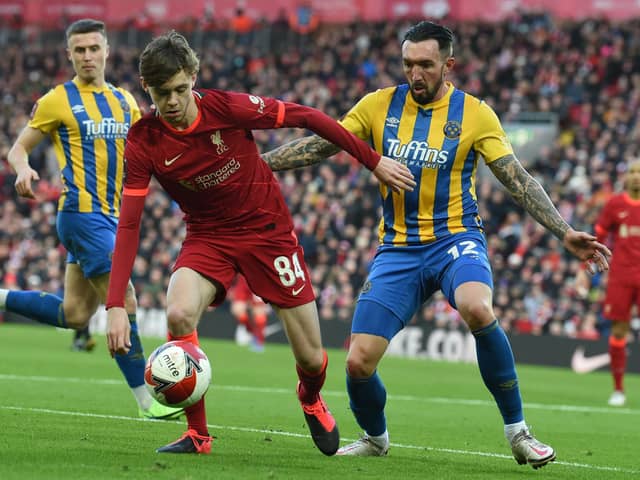 Conor Bradley in action against Shrewsbury Town in the FA Cup last season