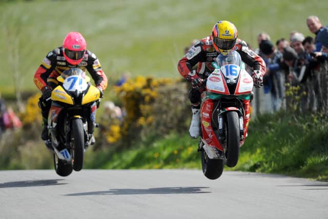 John Burrows and Davy Morgan in action at the Cookstown 100 in 2012.