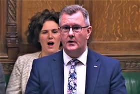 Sir Jeffrey Donaldson addresses the Commons (with Claire Hanna behind him)