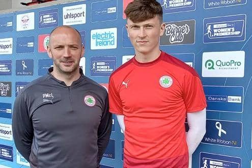 Paddy McLaughlin with Jamie Robinson (Image: Cliftonville FC)