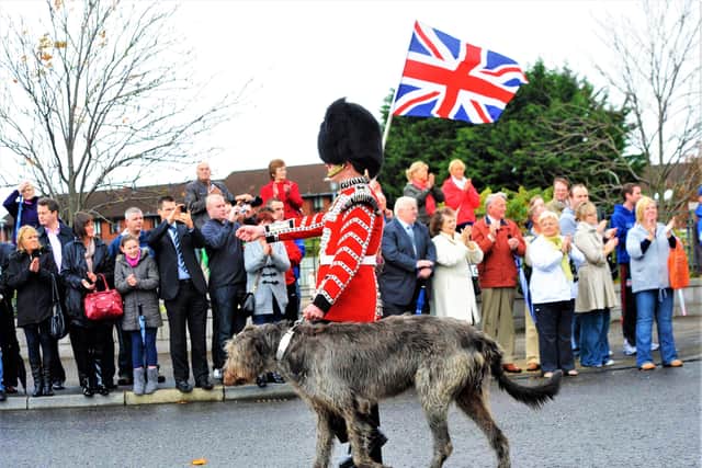 A contingent of Irish Guards (with wolfhound mascot) parading through east Belfast in 2011 after returning from Afghanistan