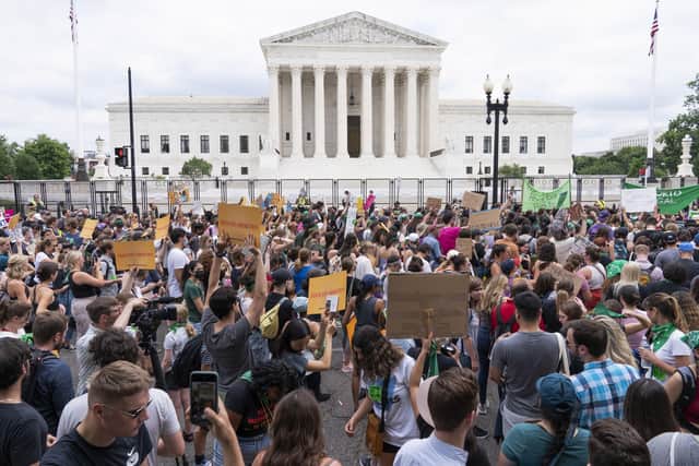 Protestors outside the US Supreme Court, after it overturned the constitutional right to an abortion