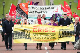 Press Eye - Belfast - Northern Ireland - 25th June 2022 - Union members pictured at a rally at Stormont, Belfast calling on Westminster to provide support to working families and for a return of a NI Executive to roll out the necessary policies and actions to seek to address this cost of living crisis.The rally was organised by trade unions NIC and ICTU.Photo by Kelvin Boyes / Press Eye.