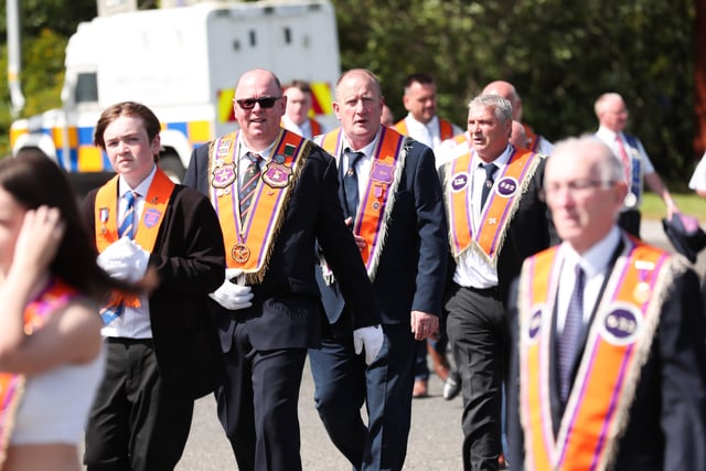 Members of the Orange Order and marching bands pictured walking onto the Springfield Road in Belfast as they take part in the annual Whiterock Parade in west Belfast this afternoon.


Photo by Kelvin Boyes / Press Eye.