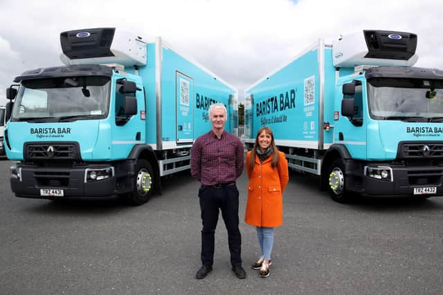 Gavin Hamill, logistics manager at Henderson Foodservice with Keavy O’Mahony-Truesdale, Barista Bar brand manager, revealing the fully branded Barista Bar delivery lorries