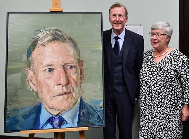 Lord Trimble with his wife Daphne after the unveiling of his portrait by Colin Davidson at Queen's Management School, Riddel Hall in Belfast