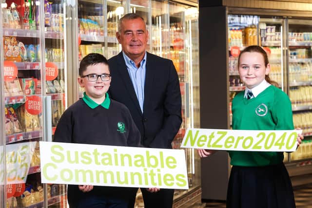 Cillian Quinn, Clea Primary School, Trevor Magill, managing director at Musgrave NI and Lara Donnelly, St Francis of Assisi Primary School