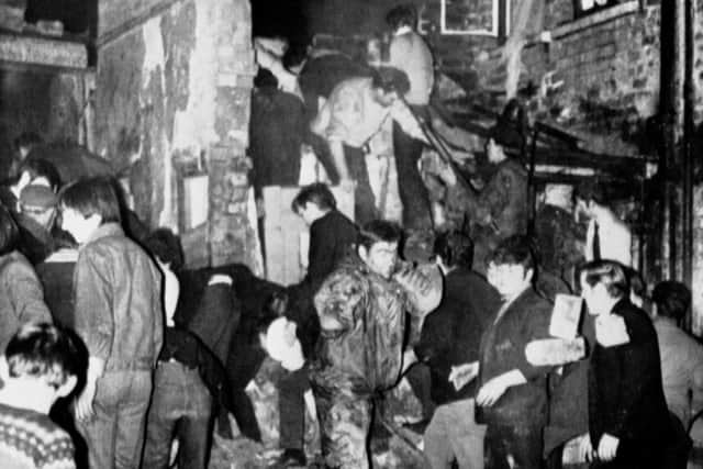 The aftermath of the bomb blast at McGurk's bar in North Queen Street, Belfast