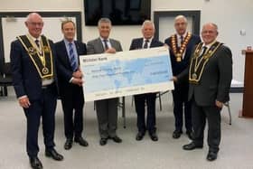 The cheque was presented to Somme Nursing Home representatives at a special event held in the Royal Black Institution’s new headquarters in Loughgall