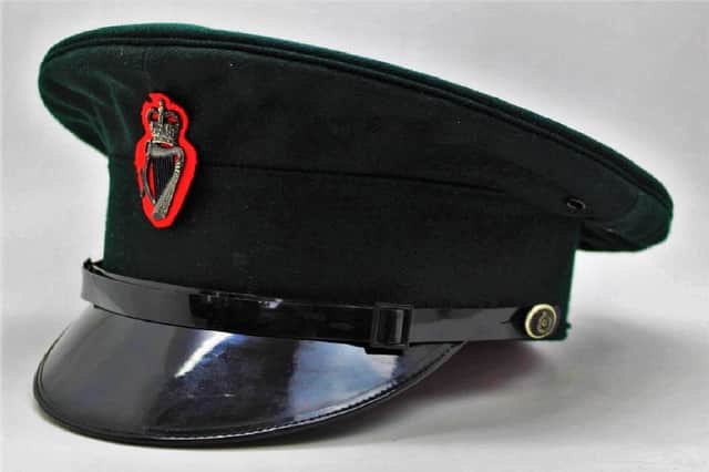 A cap bearing the badge of the Royal Ulster Constabulary