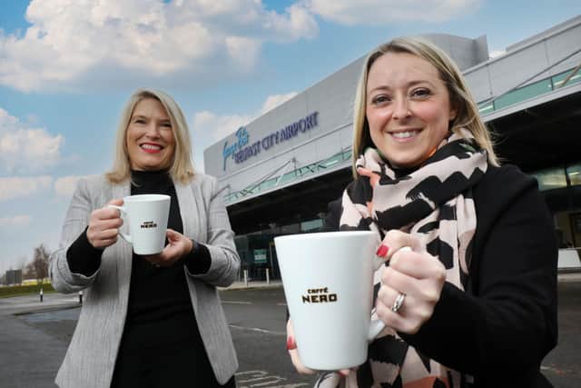Judith Davis, airport operations manager, and Fiona McVeigh, area manager at Caffe Nero, welcoming the new Caffe Nero branch at Belfast City Airport