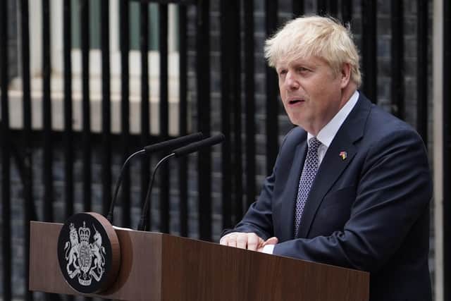 Prime Minister Boris Johnson reads a statement outside 10 Downing Street, formally resigning as Conservative Party leader