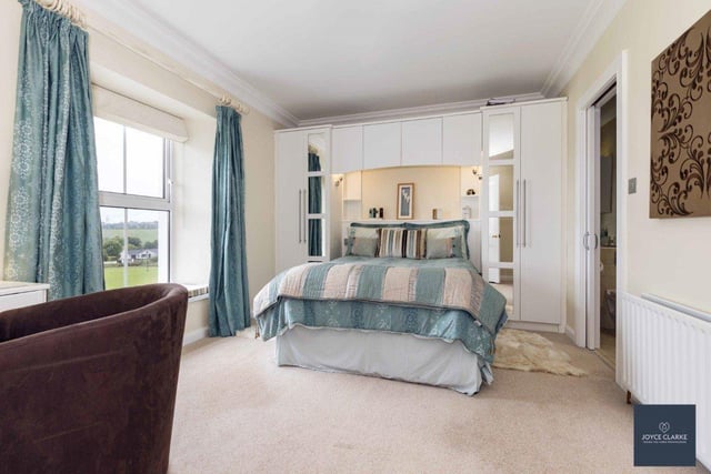 One of the spacious bedrooms in this charming farmhouse.