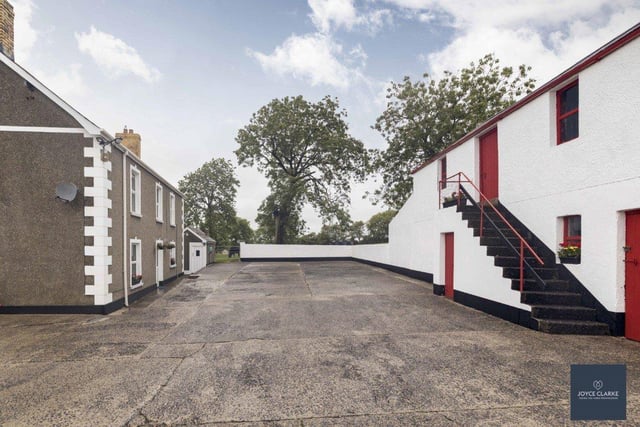 The charming detached farmhouse is set within an original courtyard setting.