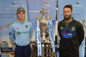 CSNI’s Luke Georgeson and CIYMS captain Nigel Jones with the Gallagher Challenge Cup trophy. Pic courtesy of the NCU