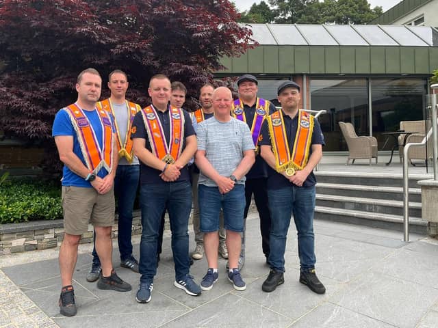 DUP Councillor Errol Thompson meets members of Sussex Crown Defenders LOL 848 in Omagh
