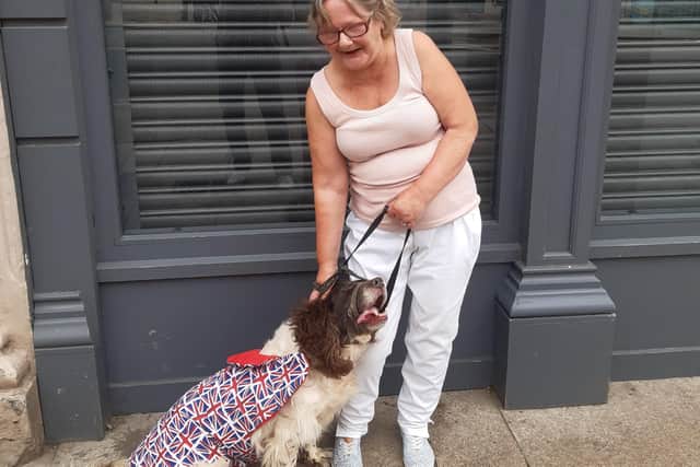 May and her dog Lucy enjoying the Belfast parade