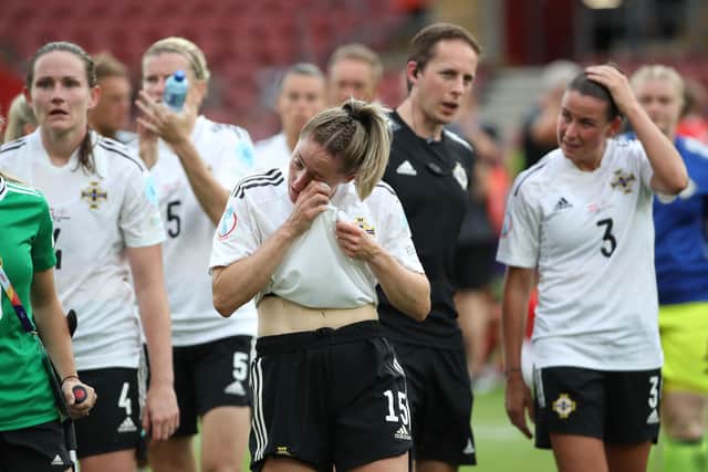 Dejected Northern Ireland players following the 2-0 defeat to Austria in Euro 2022. Pic by PressEye Ltd.