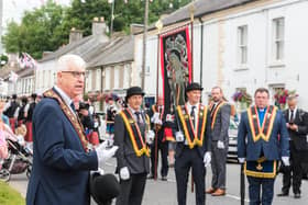 RBL Sovereign Grand Master Rev William Anderson (left) in Scarva last July when a wreath was laid at the war memorial. The traditional sham fight pageant did not take place in 2020 or 2021 due to the Covid pandemic.
