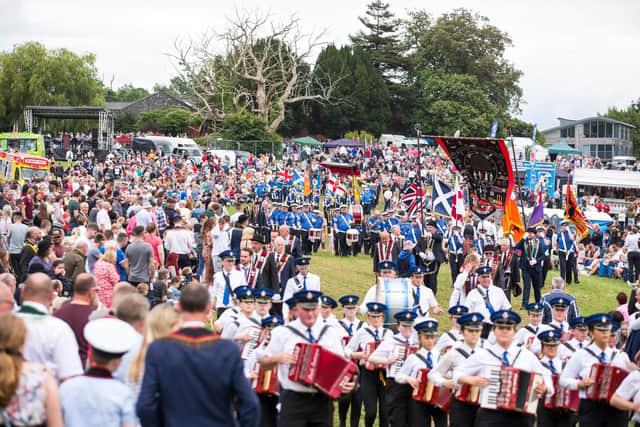 The Royal Black Institution welcomed tens of thousands to Scarva for its annual parade and Sham Fight. Photo by Graham Baalham-Curry
