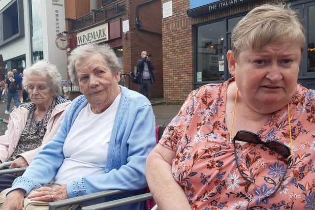 Denise Gordon, right, says she is not surprised that BBC NI axed its Twelfth coverage. She is seen alongside her mum Amy Gordon, and Maureen Allingham, on the Lisburn Road