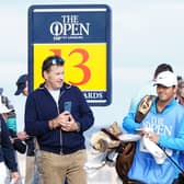 Northern Ireland's Rory McIlroy (right) with Nick Faldo (left) on the 13th during practice day four of The Open at the Old Course, St Andrews. Pic by PA.