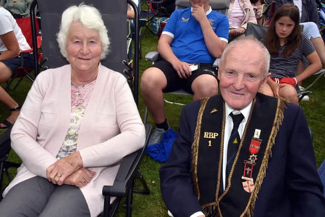 Neighbours, Lila Whitten and Jim Walker who are from Scarva were able to bag the best seats at the RBP annual 13th July event at Scarvagh House. NL28-209.