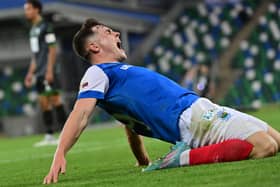 Ethan Devine celebrates his extra-time goal that helped secure Champions League progress for Linfield over The New Saints. Pic by Pacemaker
