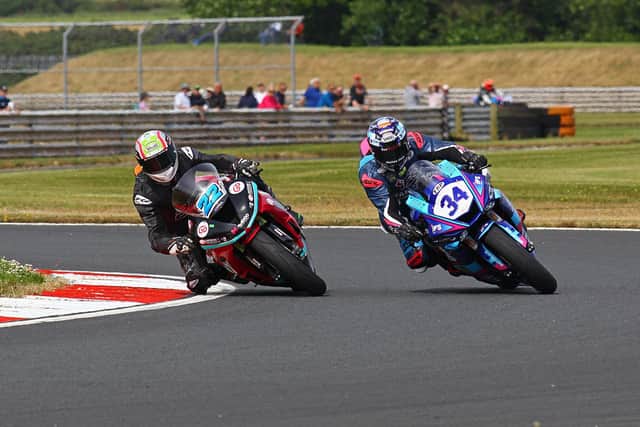 Eunan McGlinchey (McAdoo Kawasaki) and Alastair Seeley (IFS Yamaha) battled it out for Supersport honours at Bishopscourt in County Down on Saturday.