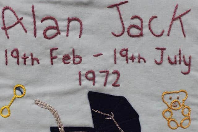 A quilt patch remembering Alan Jack. No photo exists of the five-month-old baby who died in a bomb attack in Strabane 50 years ago