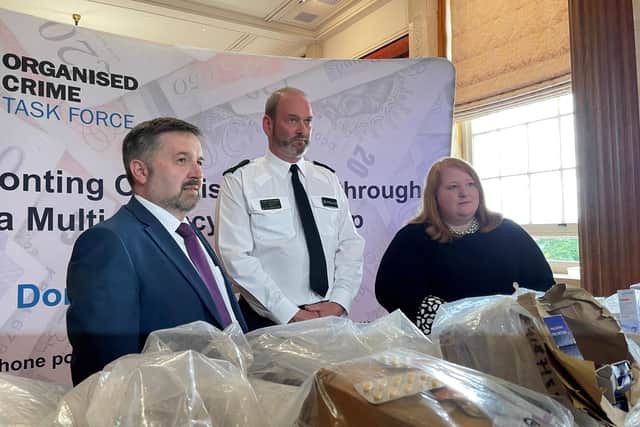 Some of the illicit online prescription drugs destined for addresses in Northern Ireland seized as part of Operation Pangea which were put on display during a photocall with Health Minister Robin Swann, PSNI assistant chief constable Mark McEwan and  Justice Minister Naomi Long at Stormont