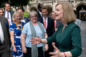 Foreign Secretary and Tory leadership candidate, Liz Truss, celebrates with her supporters in the Houses of Parliament after making it along with Rishsi Sunak to the final two candidates to be Prime Minister