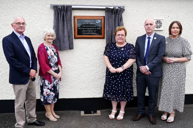 Children of bus driver Jackie Gibson (from left) Robert Gibson, Hilary Magowan, Lynda Van Cuylenburg, Stephen Gibson and Dorothy Crockard, at an event with some of their father's former colleagues in Ulsterbus and current drivers to unveil a plaque at the depot in Ballygowan where he began his journey on Bloody Friday. . Photo: Brian Lawless/PA Wire
